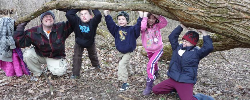 Cub scouts and friends playing in the Osage orange grove